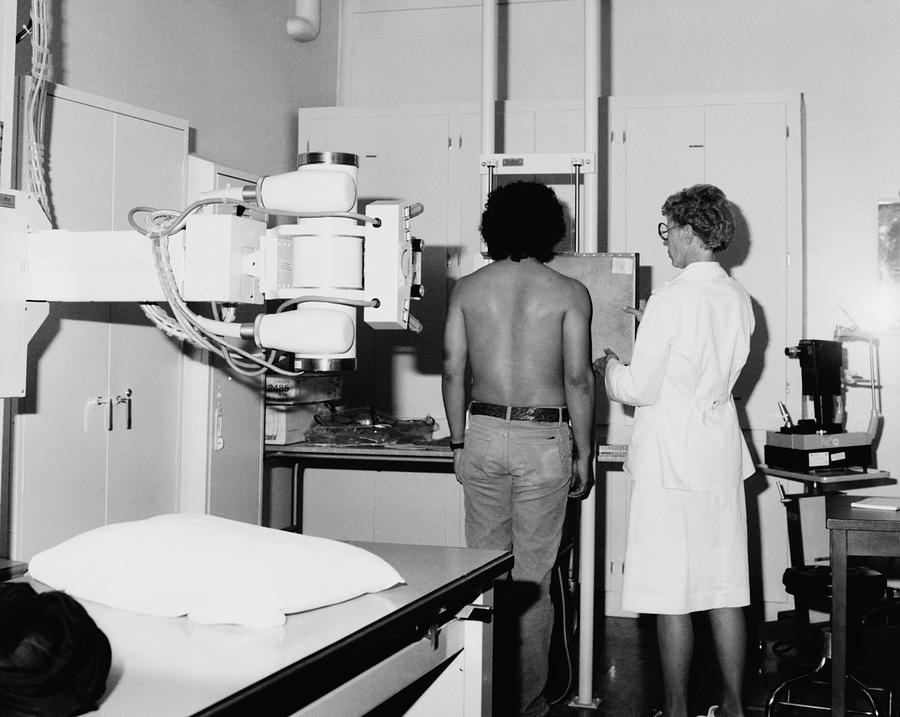 Medical Exam, 1985 Photograph by Granger