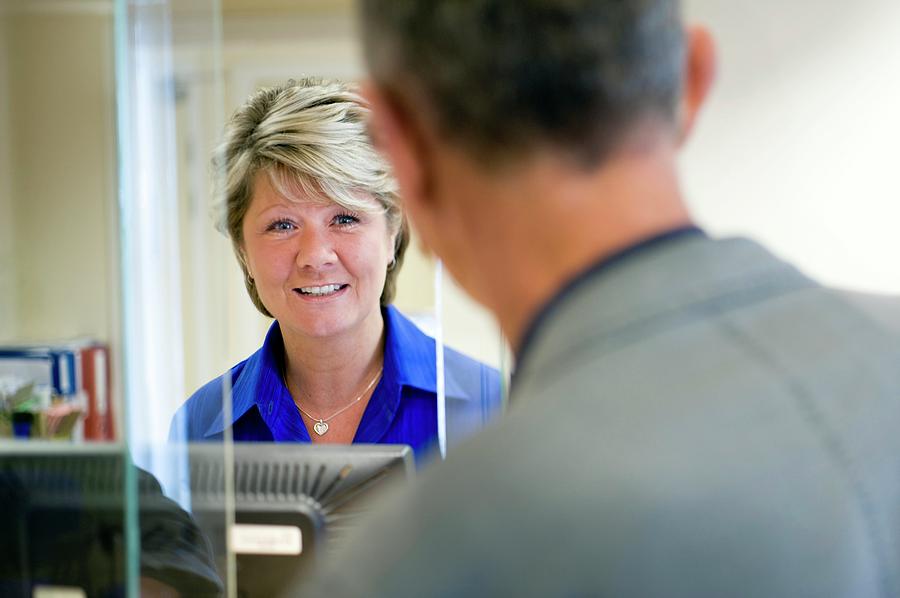 Medical Receptionist Photograph by Jim Varney/science Photo Library ...