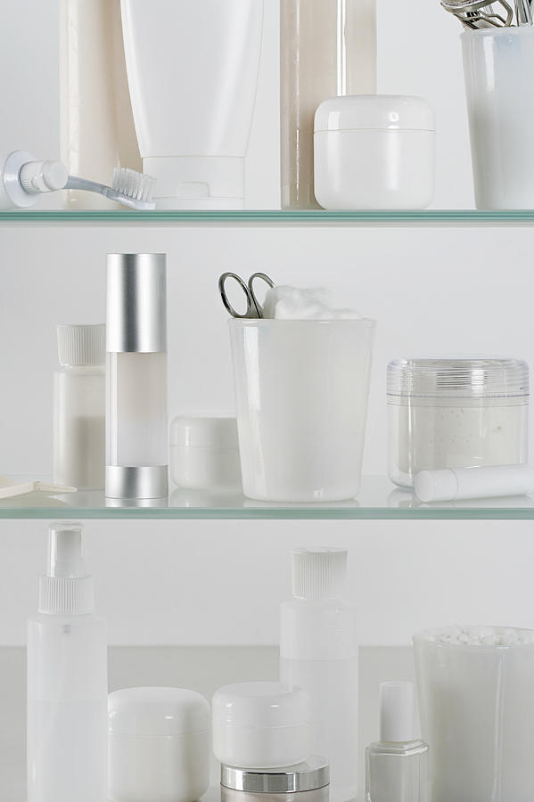 Medicine cabinet full of skincare products Photograph by Jennifer Boggs/Amy Paliwoda
