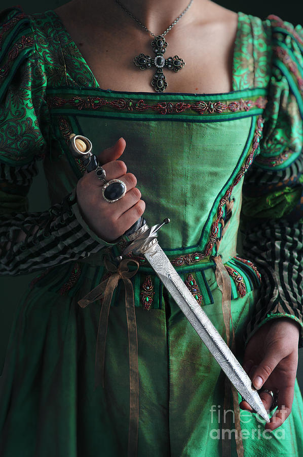Medieval Woman Holding A Dagger Photograph by Lee Avison