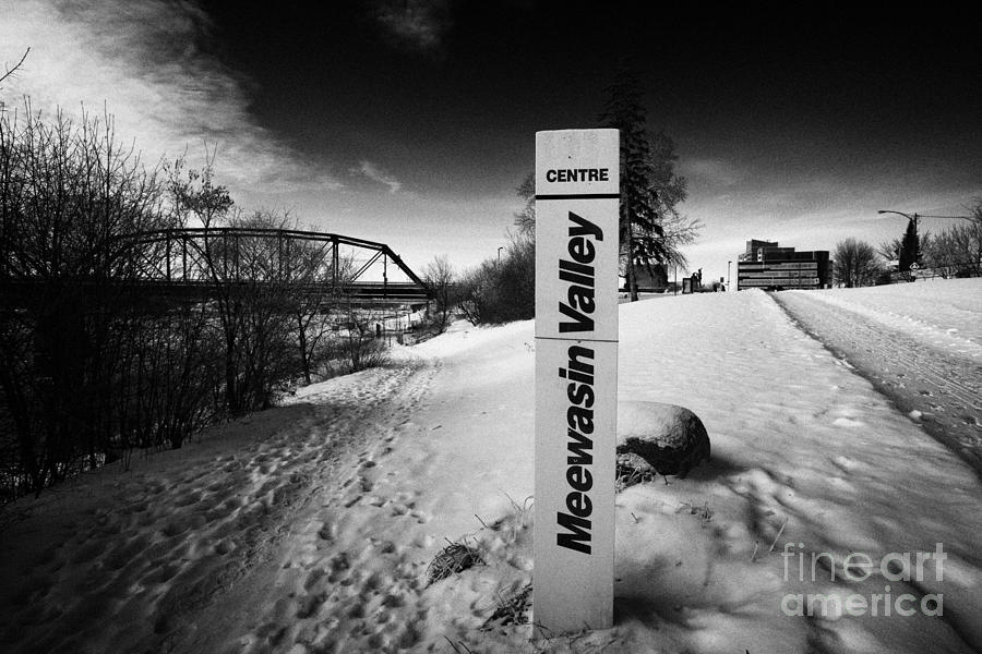 Winter Photograph - meewasin valley trail centre in the snow along friendship park near the river downtown Saskatoon Sas by Joe Fox