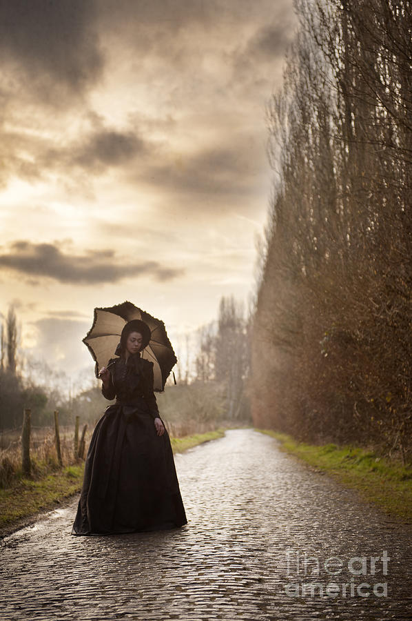 Melancholic Victorian Woman On A Cobbled Path At Dusk Photograph By Lee