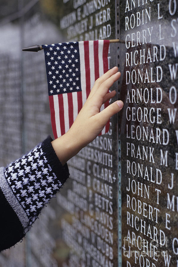 Memorial hand touching name Photograph by Jim Corwin
