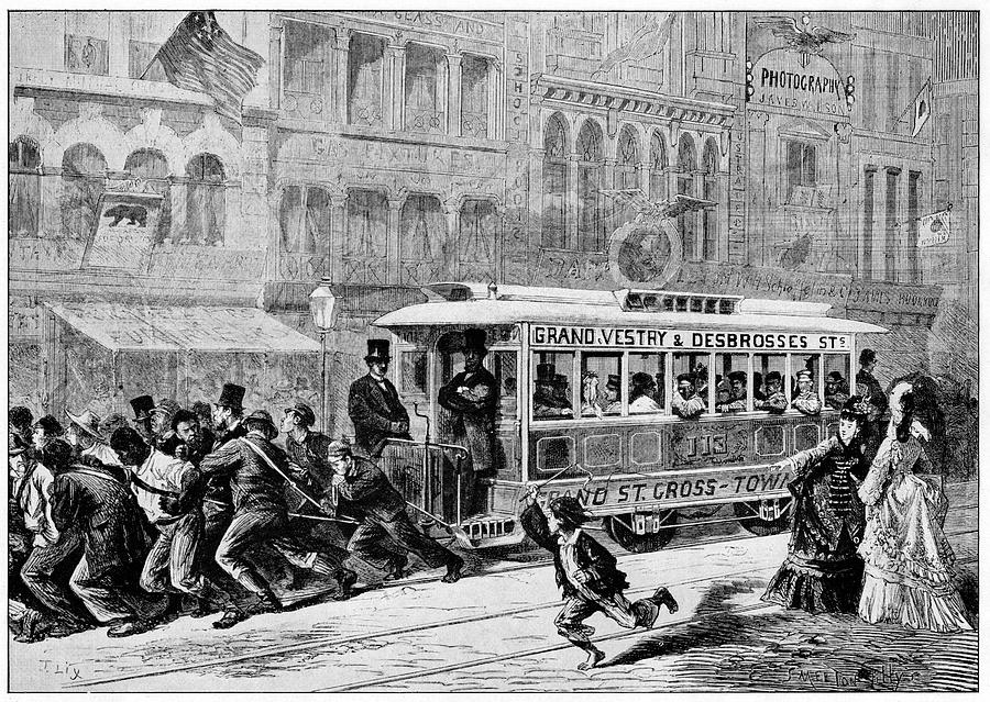 Men Pulling A Tram Photograph by Cci Archives