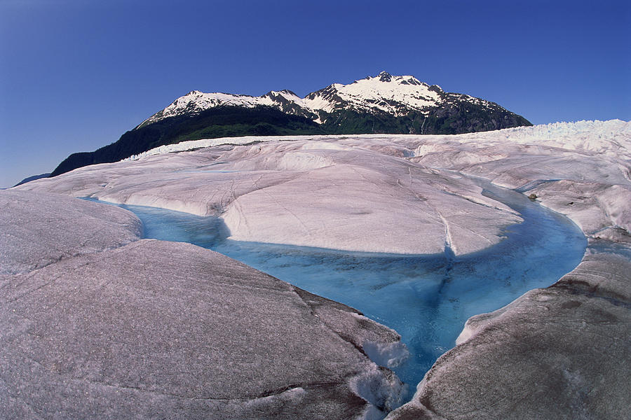 Mendenhall Ice Glacier , Juneau , Alaska Photograph by Comstock