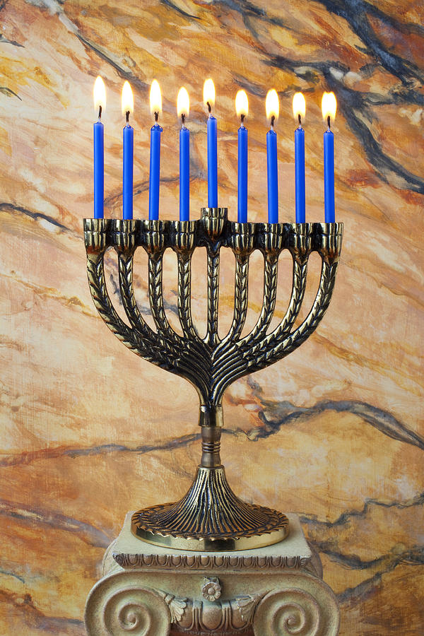 Menorah with blue candles Photograph by Garry Gay
