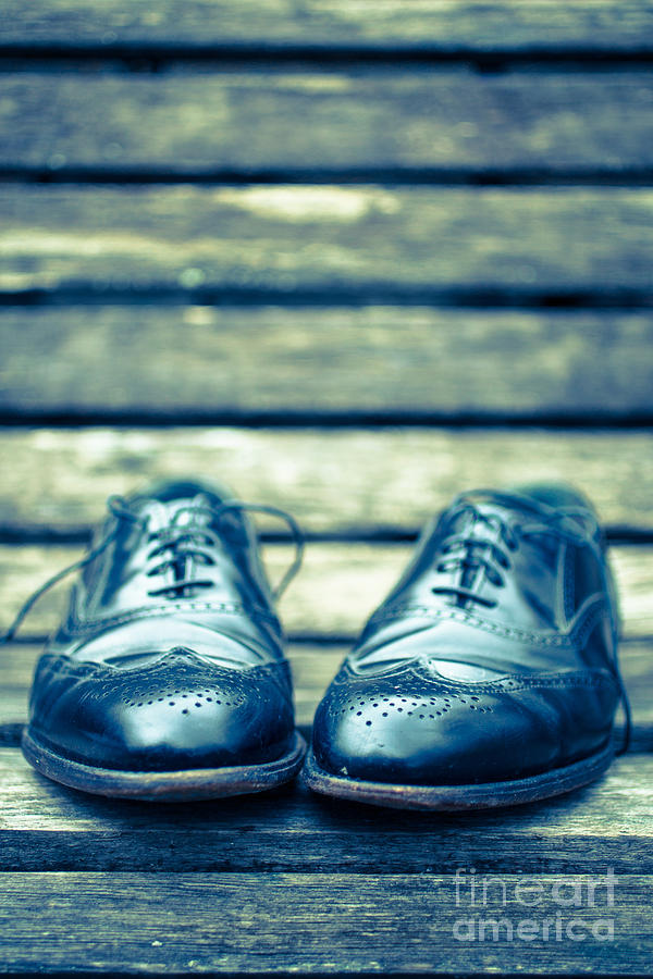 Mens Dress Shoes on park bench Photograph by Edward Fielding