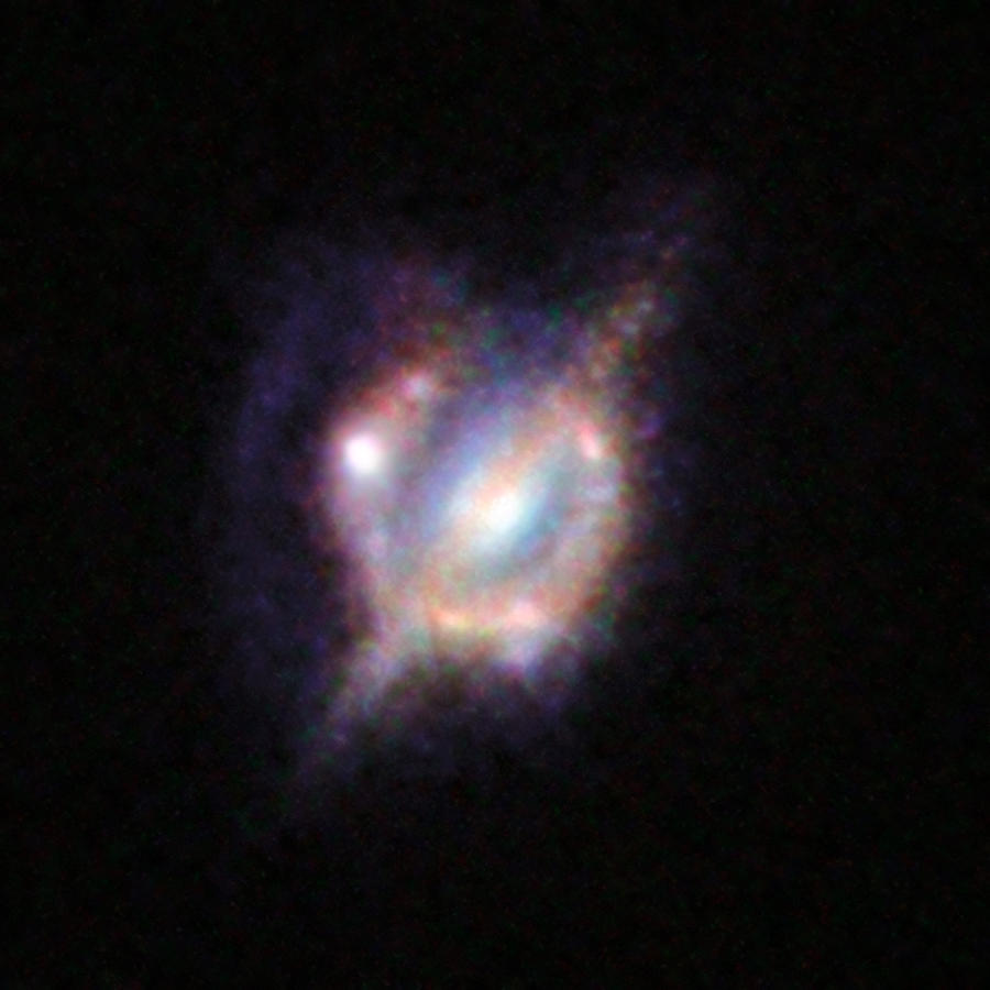 Merging Galaxies Photograph by Science Source