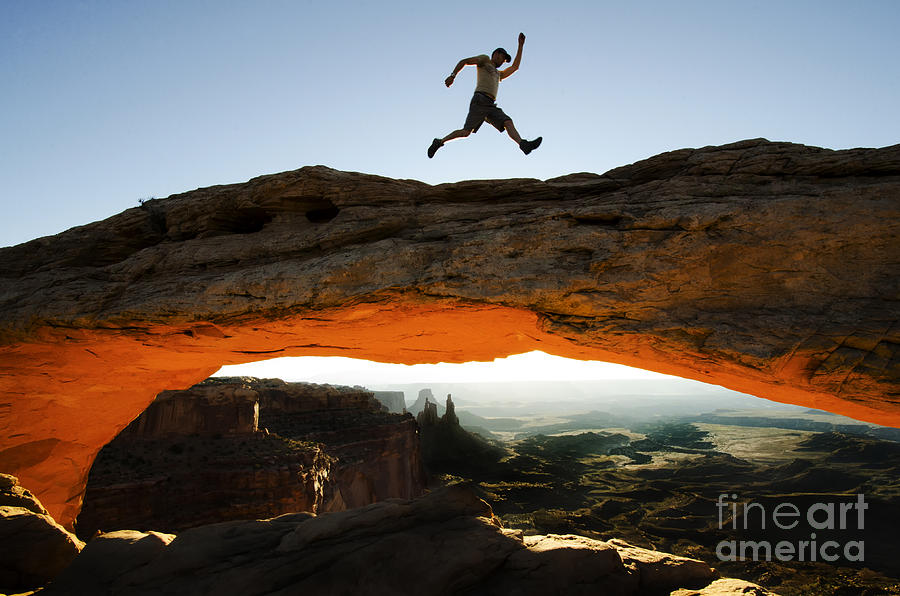 Arches National Park Photograph - Mesa Arch Midair by Bob Christopher