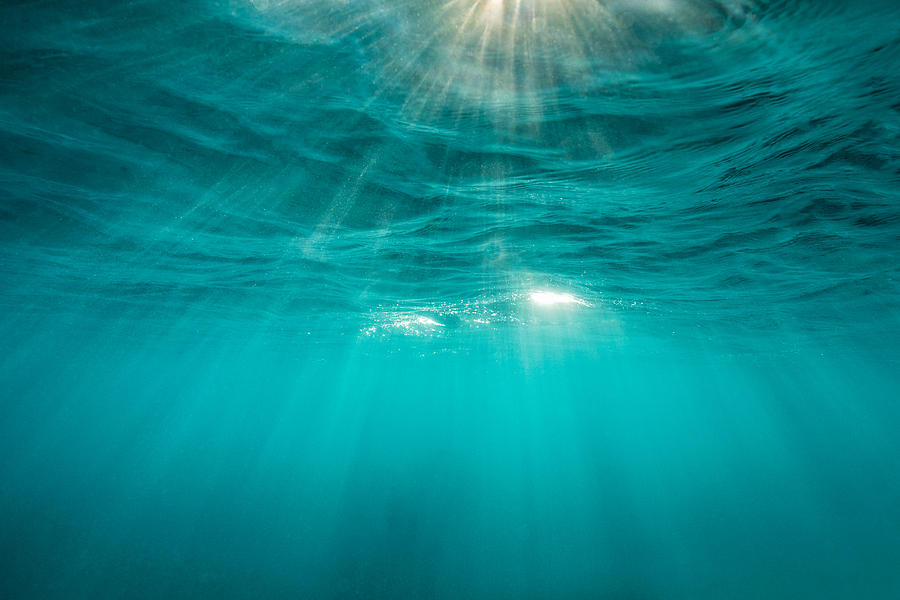 Mesmerising sunrays under the surface of the ocean Photograph by Diane Keough