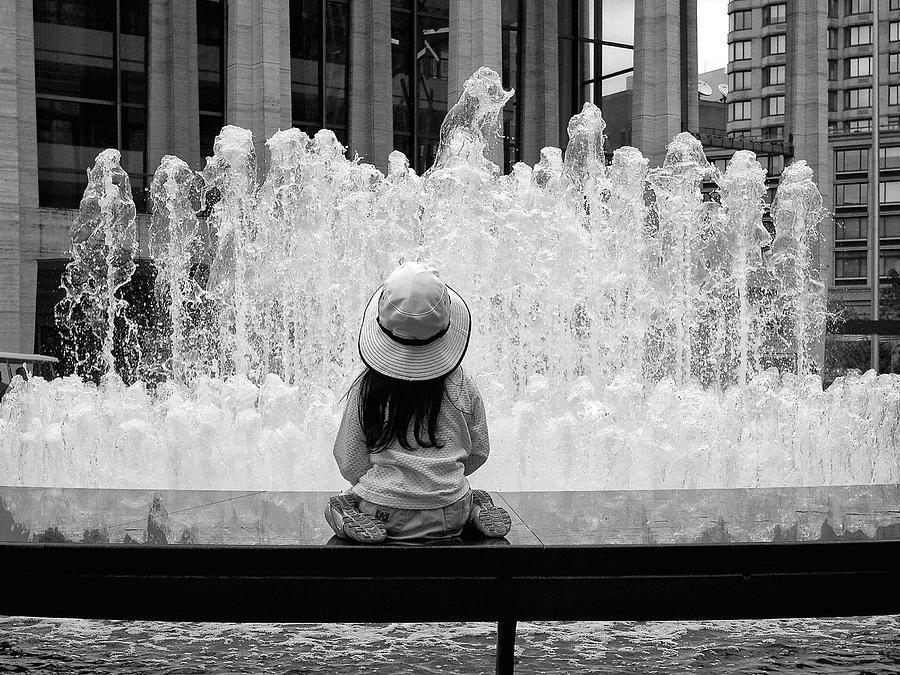 Mesmerized by a Fountain Photograph by Cornelis Verwaal