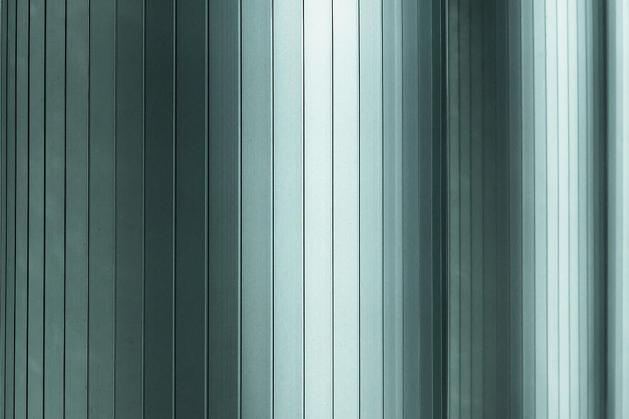 Metal Covered Columns Photograph by Ingo Jezierski