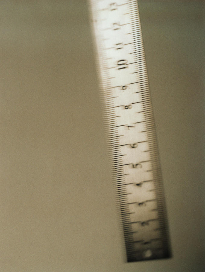 Metal ruler, close-up Photograph by Michele Constantini