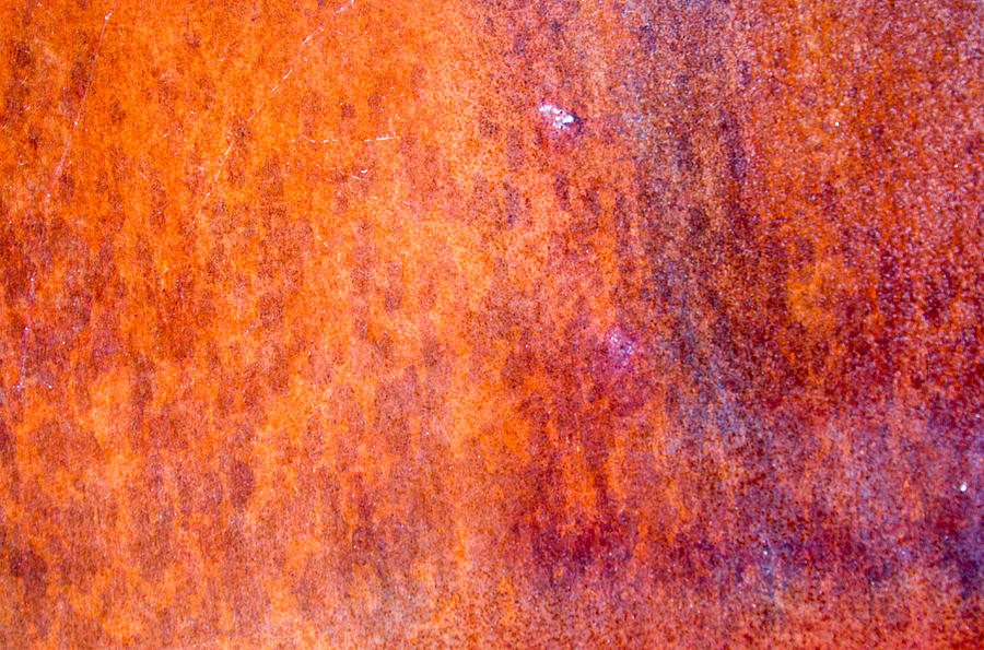 Metal with red and orange patina Photograph by Vance Bell