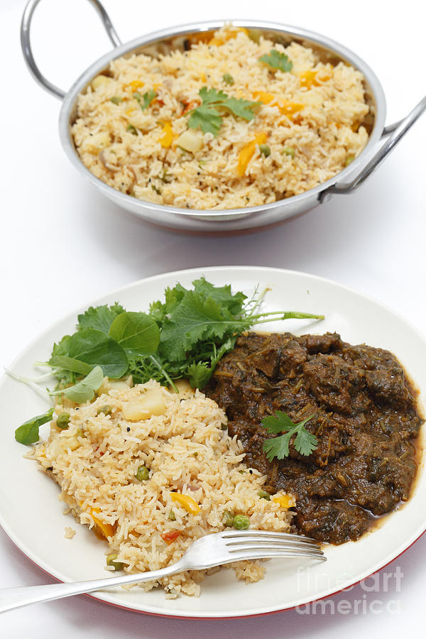 Methi lamb meal with tomato rice Photograph by Paul Cowan