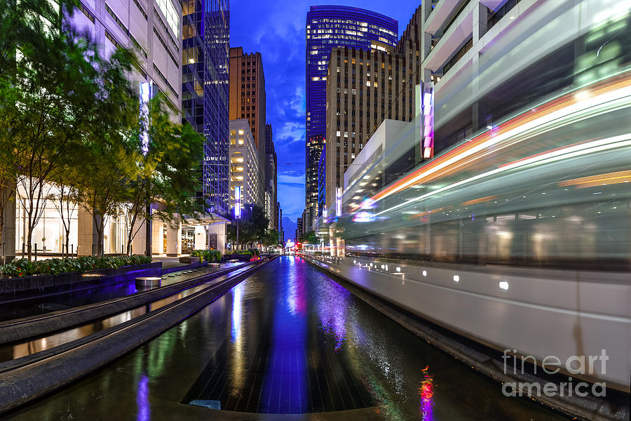 METRORail Warp Speed on Main Street- Downtown Houston Texas Photograph by Silvio Ligutti