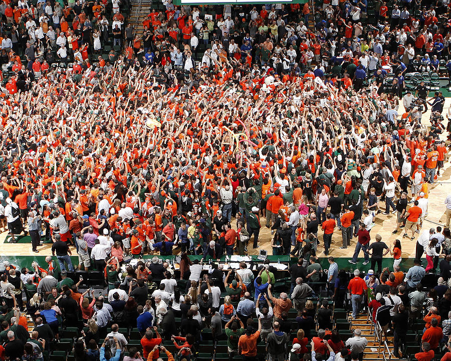 Miami Hurricanes Fans Rush The Court At Bankunited Center Photograph by ...