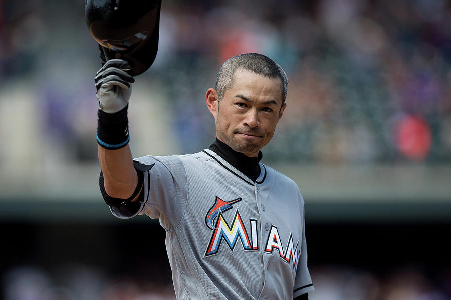 Miami Marlins V Colorado Rockies Photograph by Dustin Bradford Miami Marlins V Colorado Rockies Photograph by Dustin Bradford