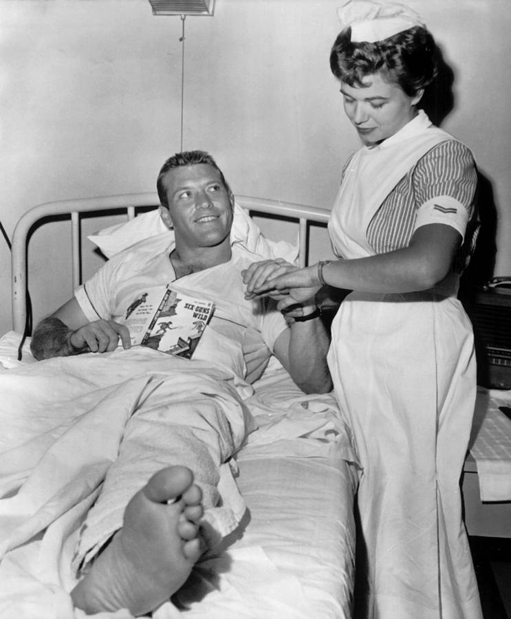Mickey Mantle Photograph - Mickey Mantle In Hospital With Nurse by Retro Images Archive