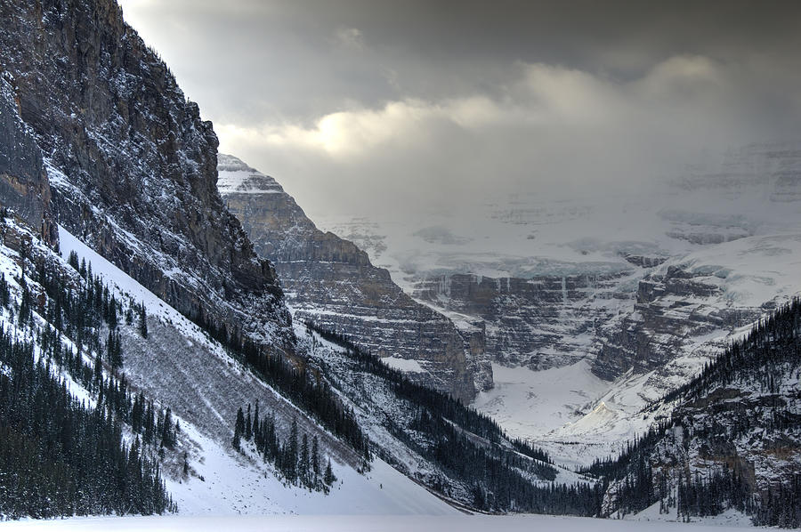 Banff National Park Photograph - Mid morning sun through clouds at Lake Louise by Phil And Karen Rispin