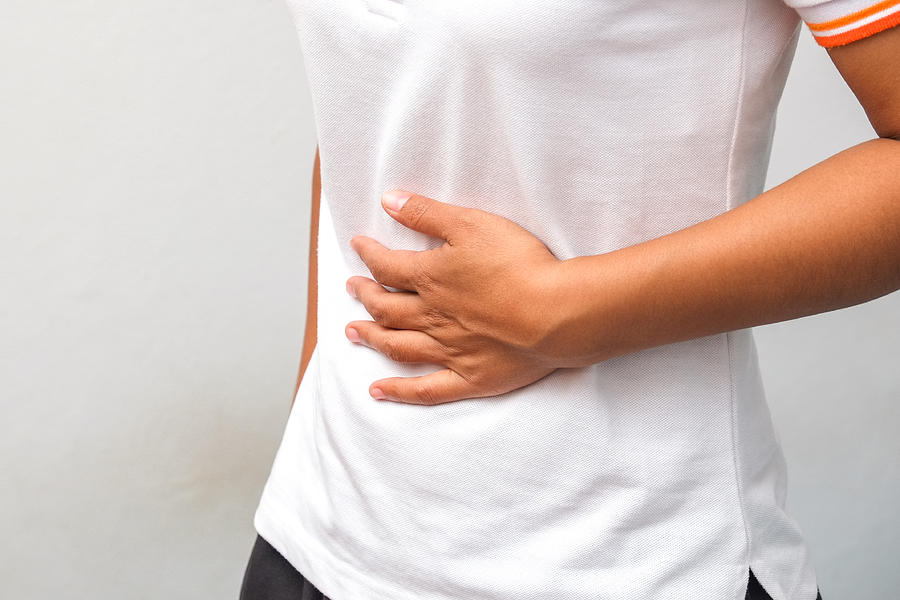 Midsection Of Woman Suffering From Stomachache Against White Background Photograph by Nattapol Sritongcom / EyeEm Midsection Of Woman Suffering From Stomachache Against White Background Photograph by Nattapol Sritongcom / EyeEm