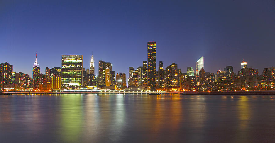 Midtown Manhattan Skyline At Dusk by John Cardasis