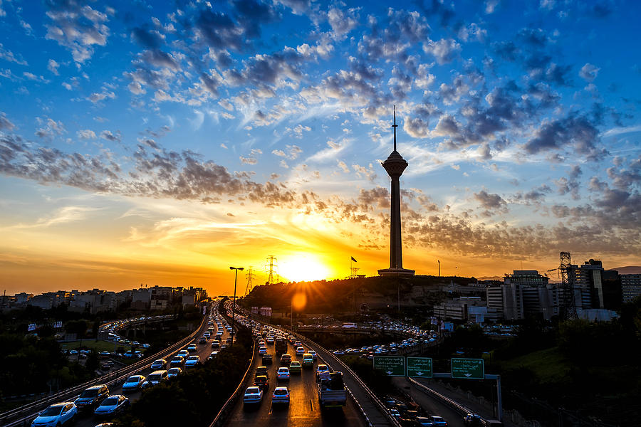 Milad Tower and street at sunset, Tehran, Iran Photograph by Mitra Samavaki
