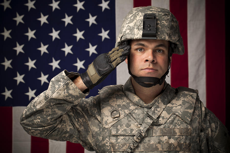 Military Soldier in front of American Flag Photograph by Inhauscreative