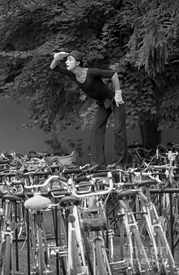 Mime performing looking for his bicycle Photograph by Jim Corwin