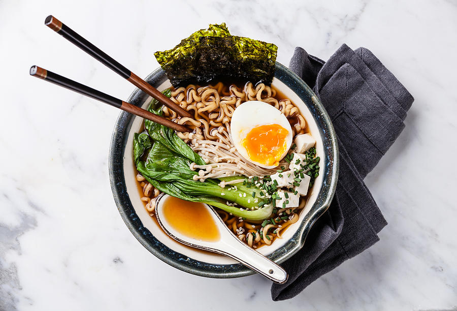 Miso Ramen noodles with egg, enoki and pak choi Photograph by Lisovskaya