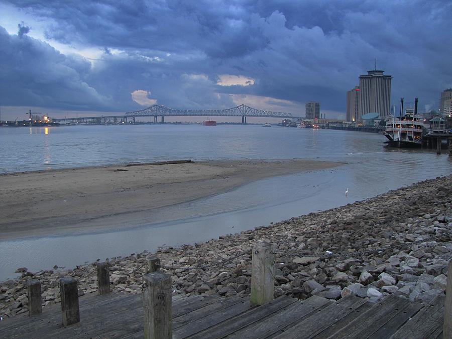 New Orleans Photograph - Mississippi River under stormy skies by Toni and Rene Maggio