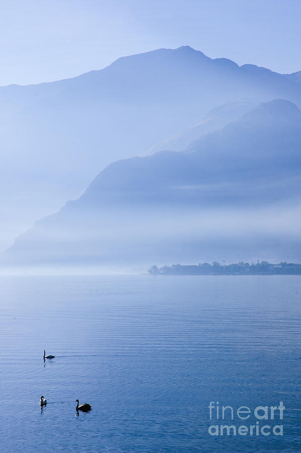 mist around mountains Lake Como Italy Photograph by Peter Noyce