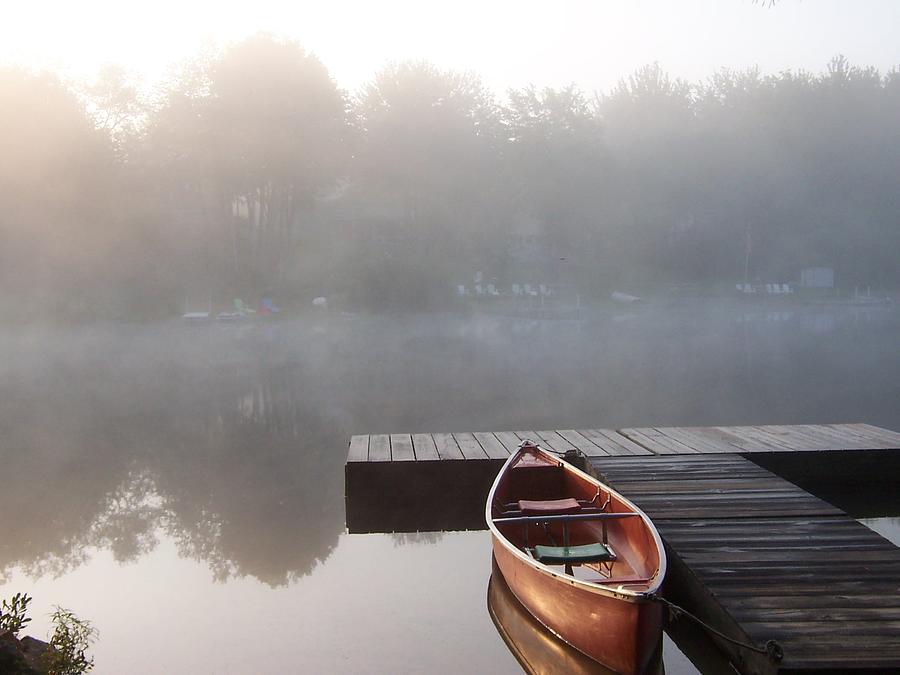 Mist floating over the Lake Photograph by Catherine Gagne