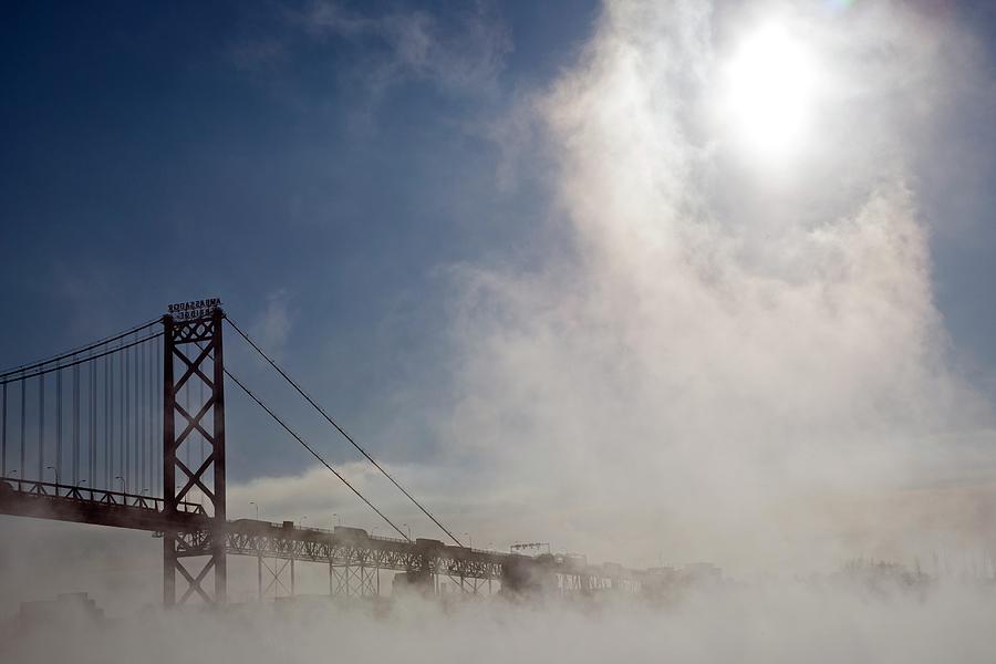 Mist-shrouded Bridge Photograph by Jim West