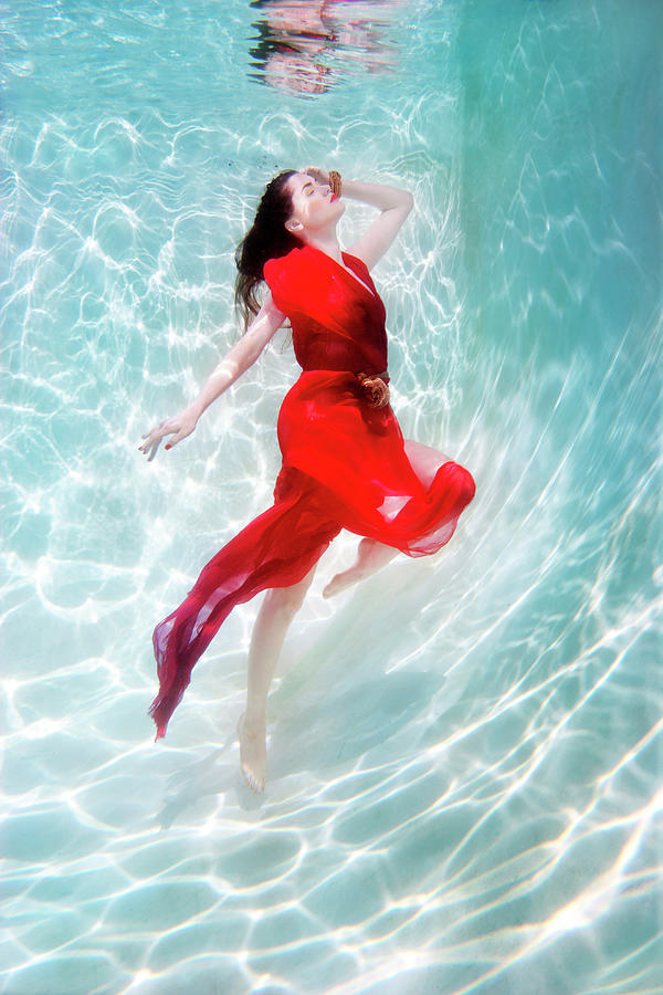 Mixed Race Woman In Dress Underwater In Photograph by Ming H2 Wu