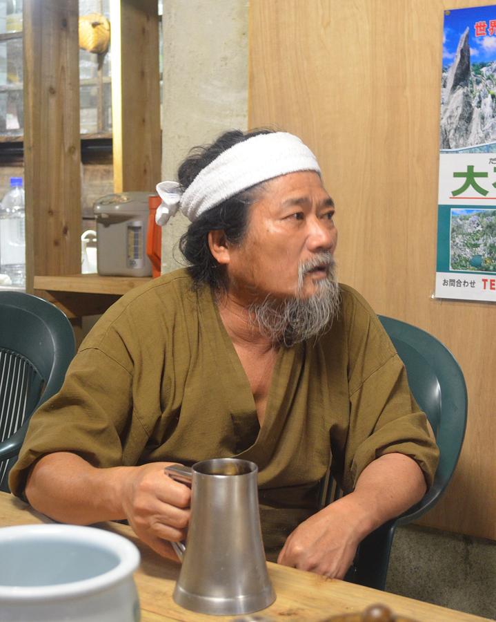 Miyagi Minshuku Owner with Okinawan Awamori Photograph by Jeff at JSJ Photography
