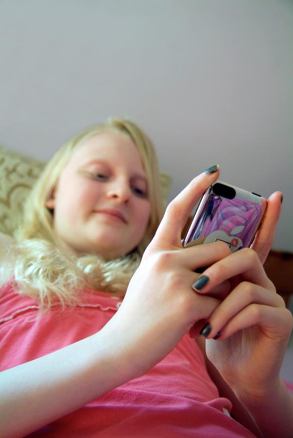 Device Photograph - Mobile Phone Use by Hannah Gal/science Photo Library