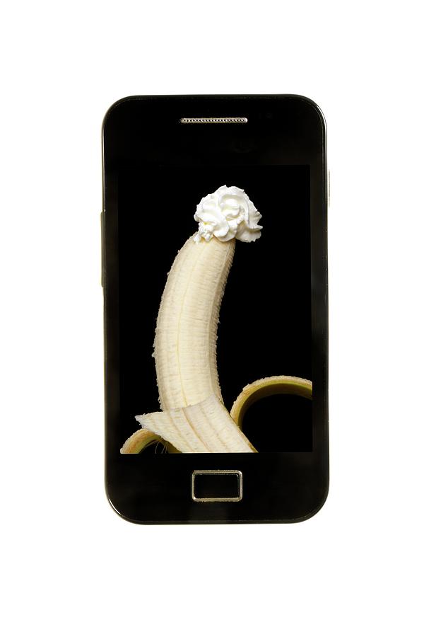 Banana Photograph - Mobile Phone With Erotic Image Of Banana by Victor De Schwanberg/science Photo Library