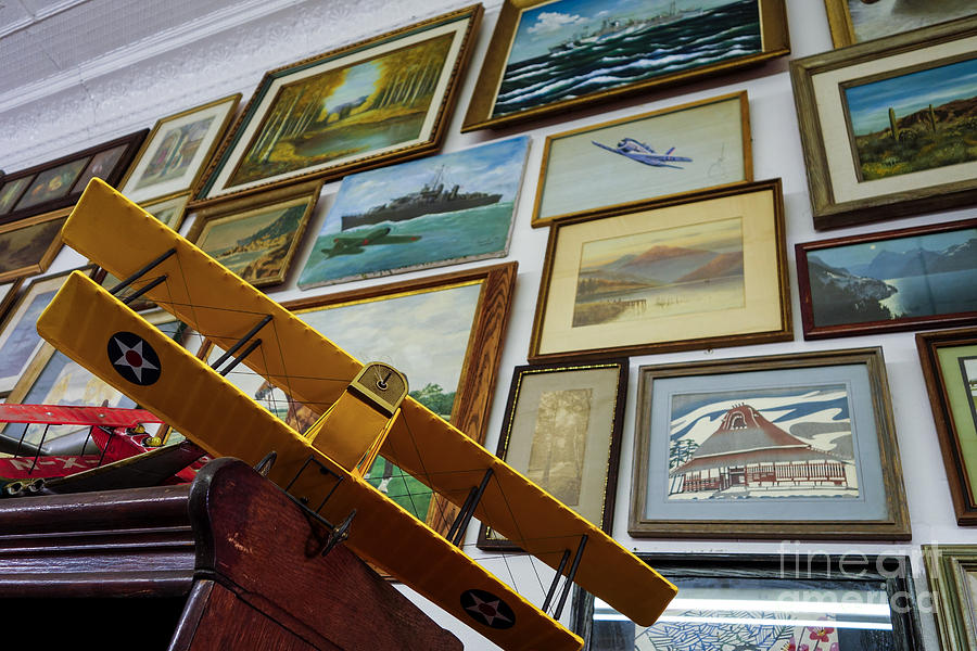 Vintage Photograph - Model airplanes near wall of framed artwork  by Amy Cicconi