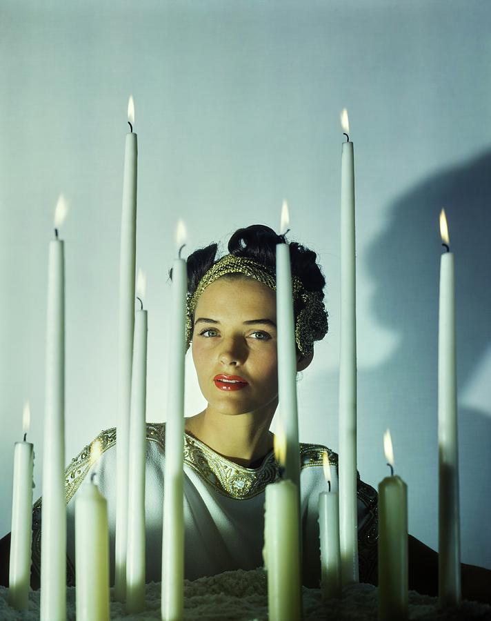 Model Behind Candles Photograph by John Rawlings
