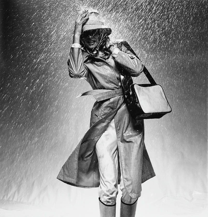 Model Caught In Heavy Rain Wearing Valentino Photograph by Chris von Wangenheim
