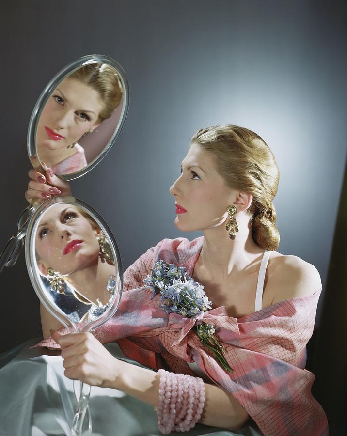 Model Holding Hand Mirrors Photograph by Horst P. Horst