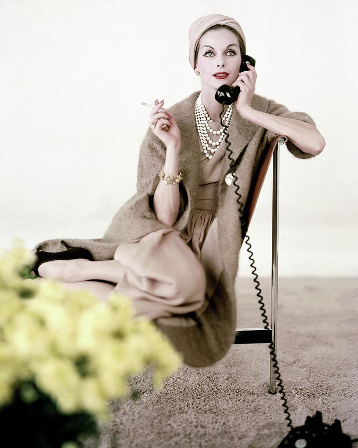 Model In Ben Zuckerman Talking On A Telephone Photograph by Karen Radkai