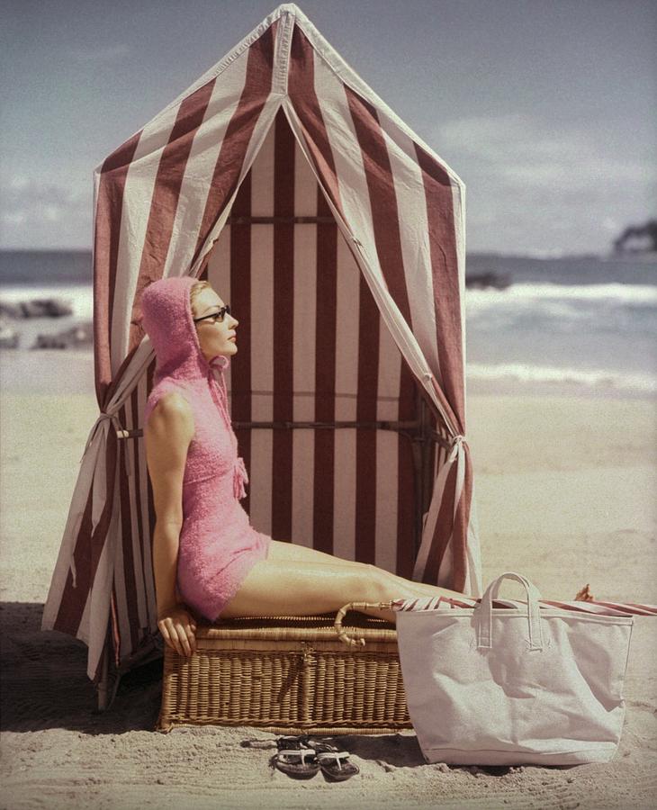 Model In Pink Swimsuit With Tent On Beach Photograph by Louise Dahl-Wolfe