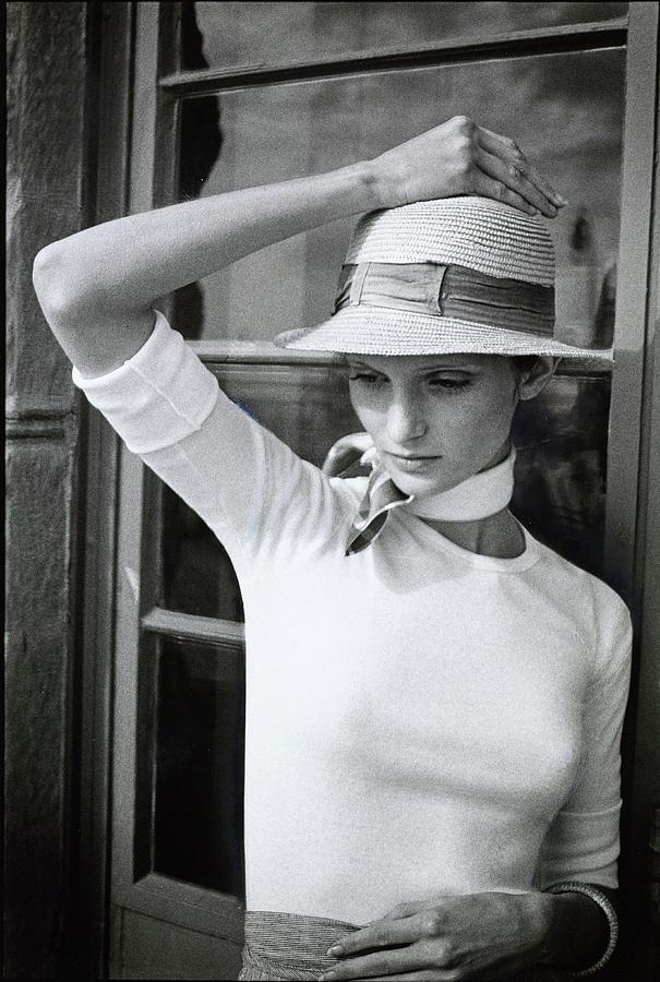 Model In Straw Hat And Knit Shirt Photograph by Barbara Bersell