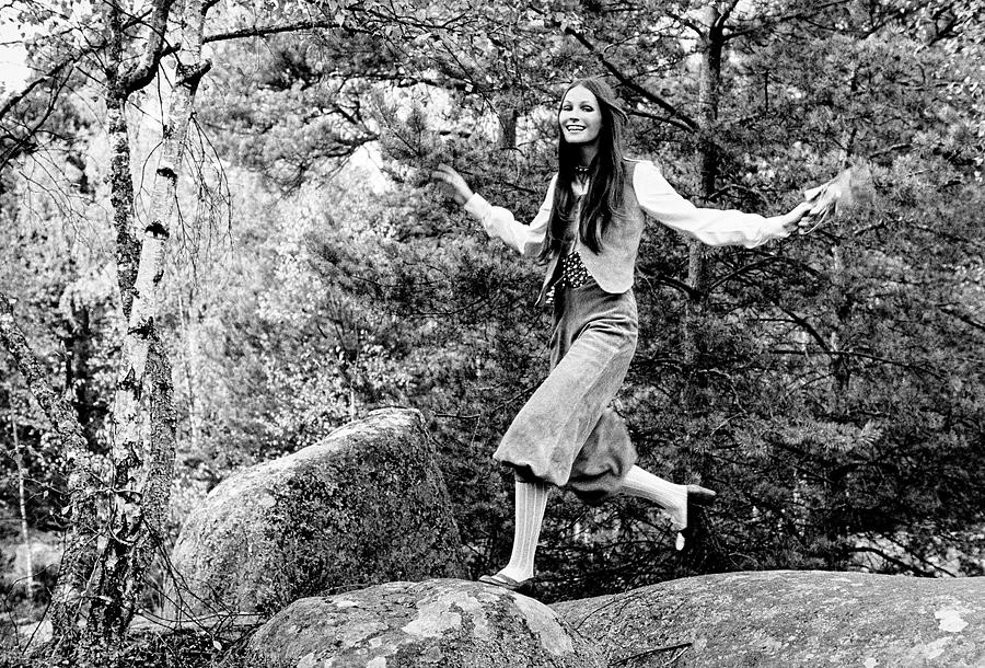 Model Jumps On A Rock Wearing Buckskin Knickers Photograph by Henry Clarke