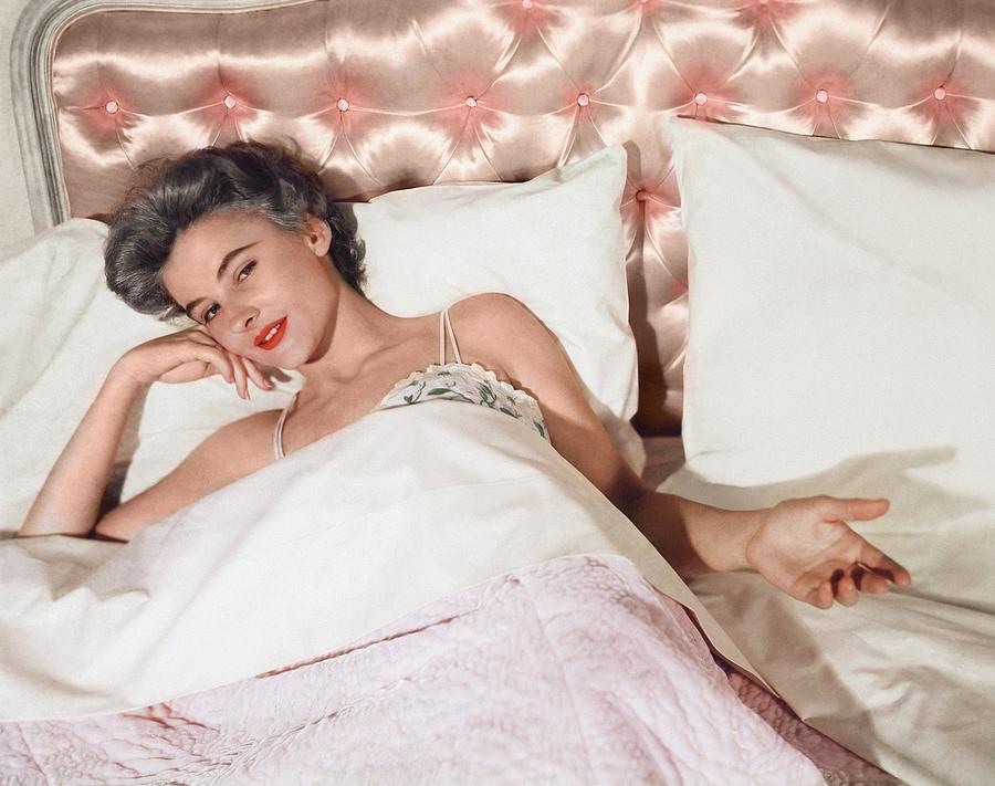 Model Lying In Pink Bed Photograph by Horst P. Horst