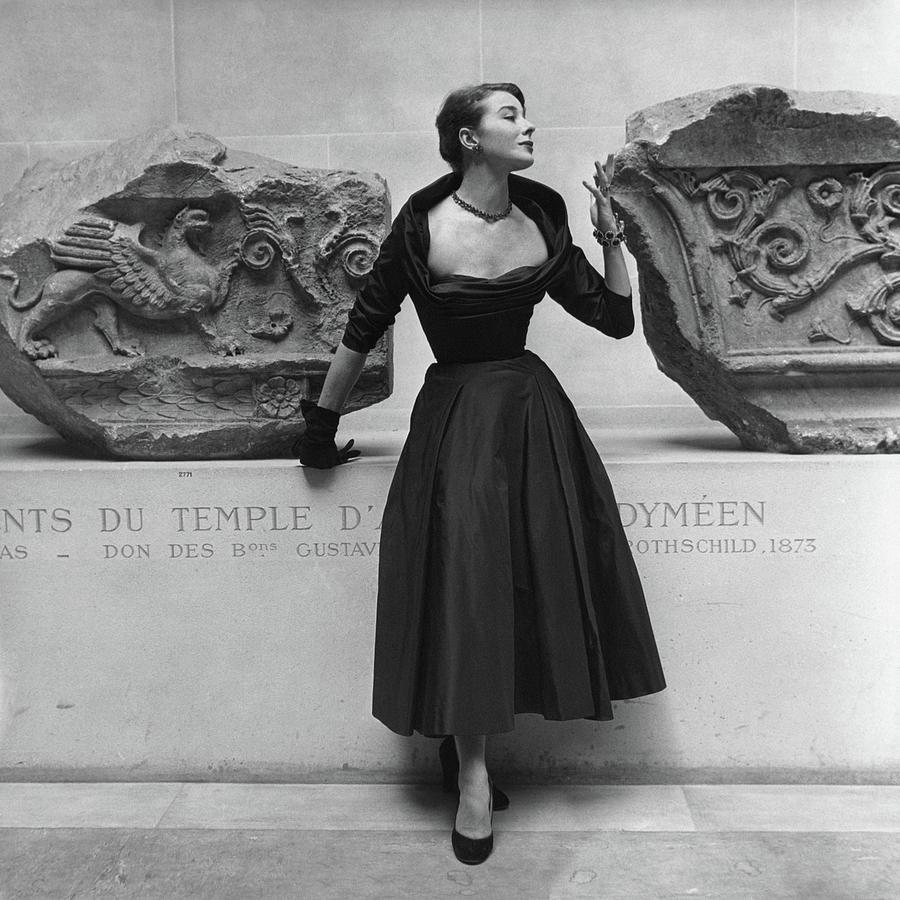 Model Standing Between Two Carved Stones Photograph by Frances McLaughlin-Gill