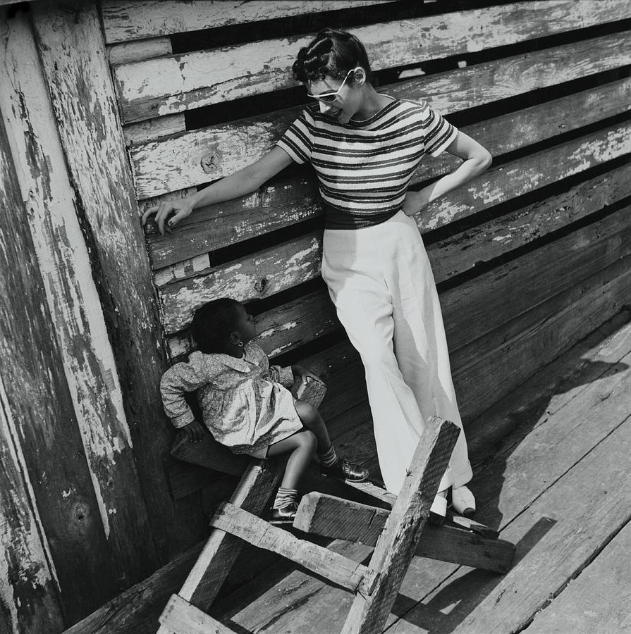 Model Talking To Girl Photograph by Toni Frissell