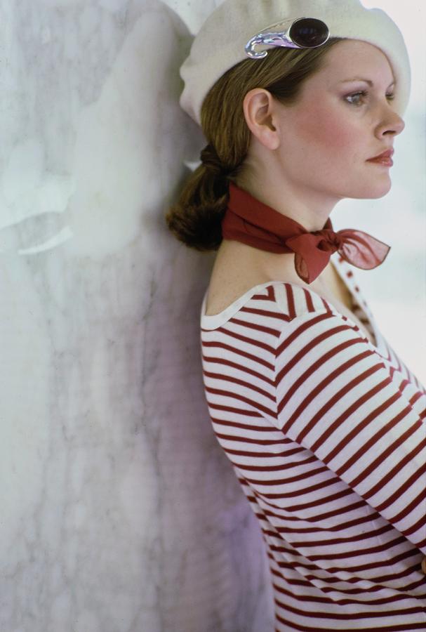 Model Wearing A Beret And Scarf Photograph by Arthur Elgort